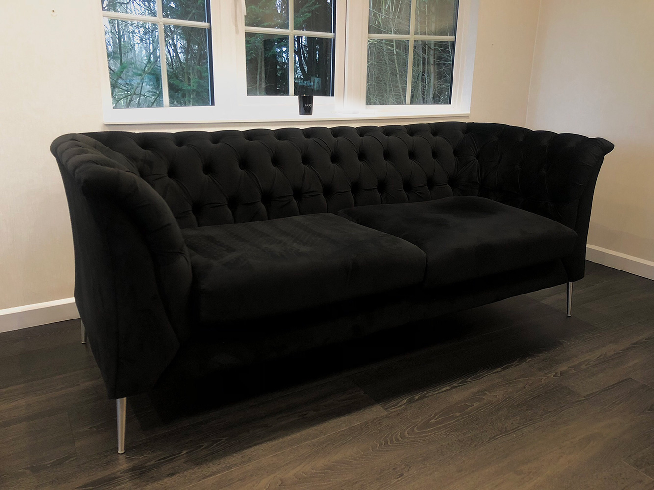 Black Chestefield Modern sofa from Chanel